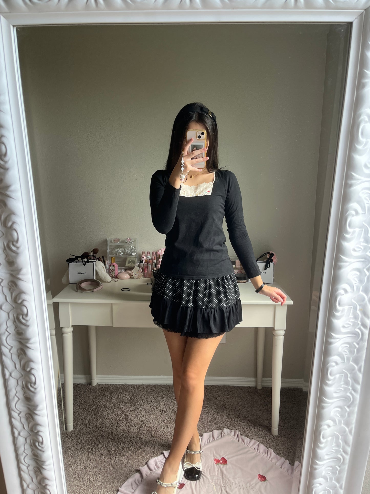 black embroidery accent top