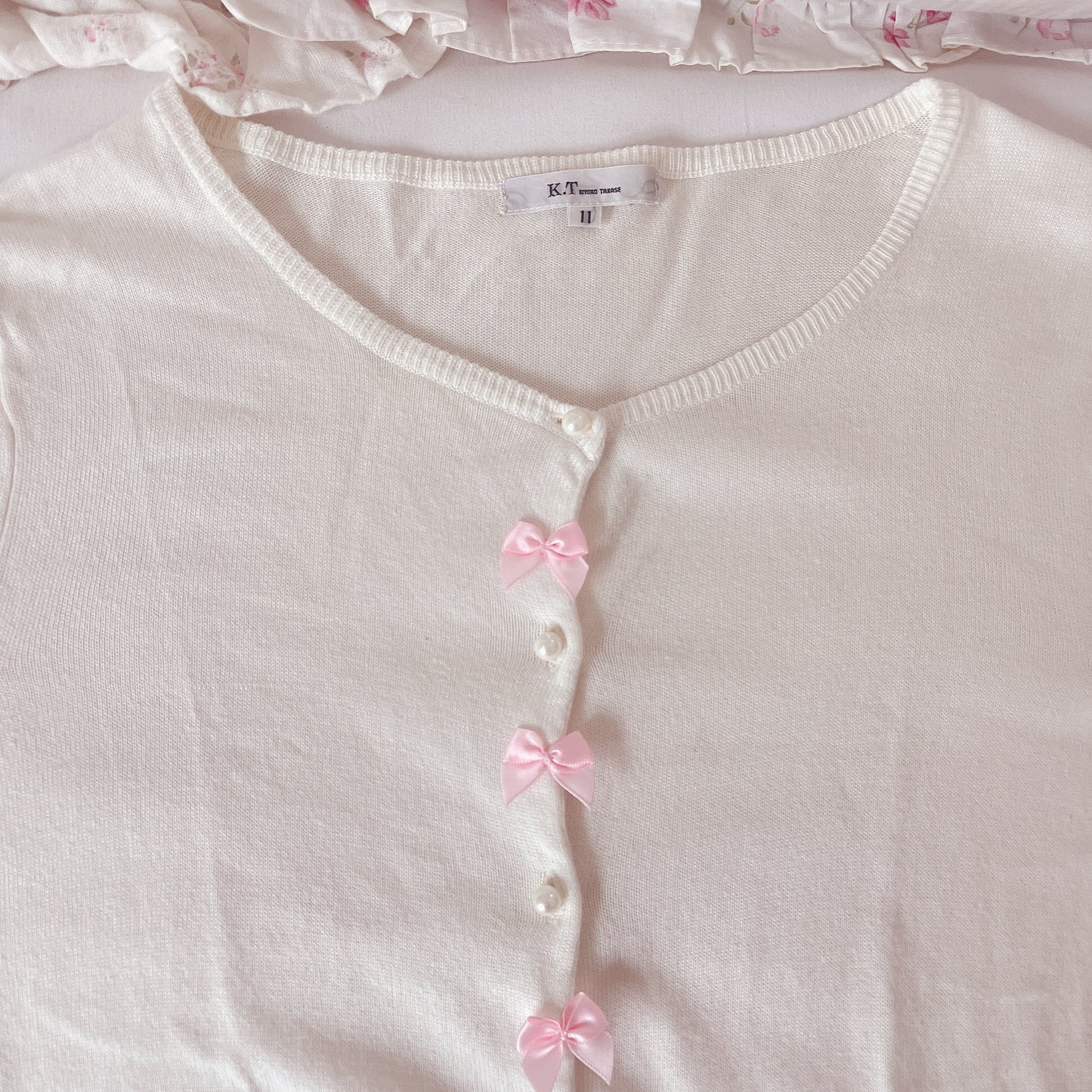 pearl and ribbon accent white cardigan