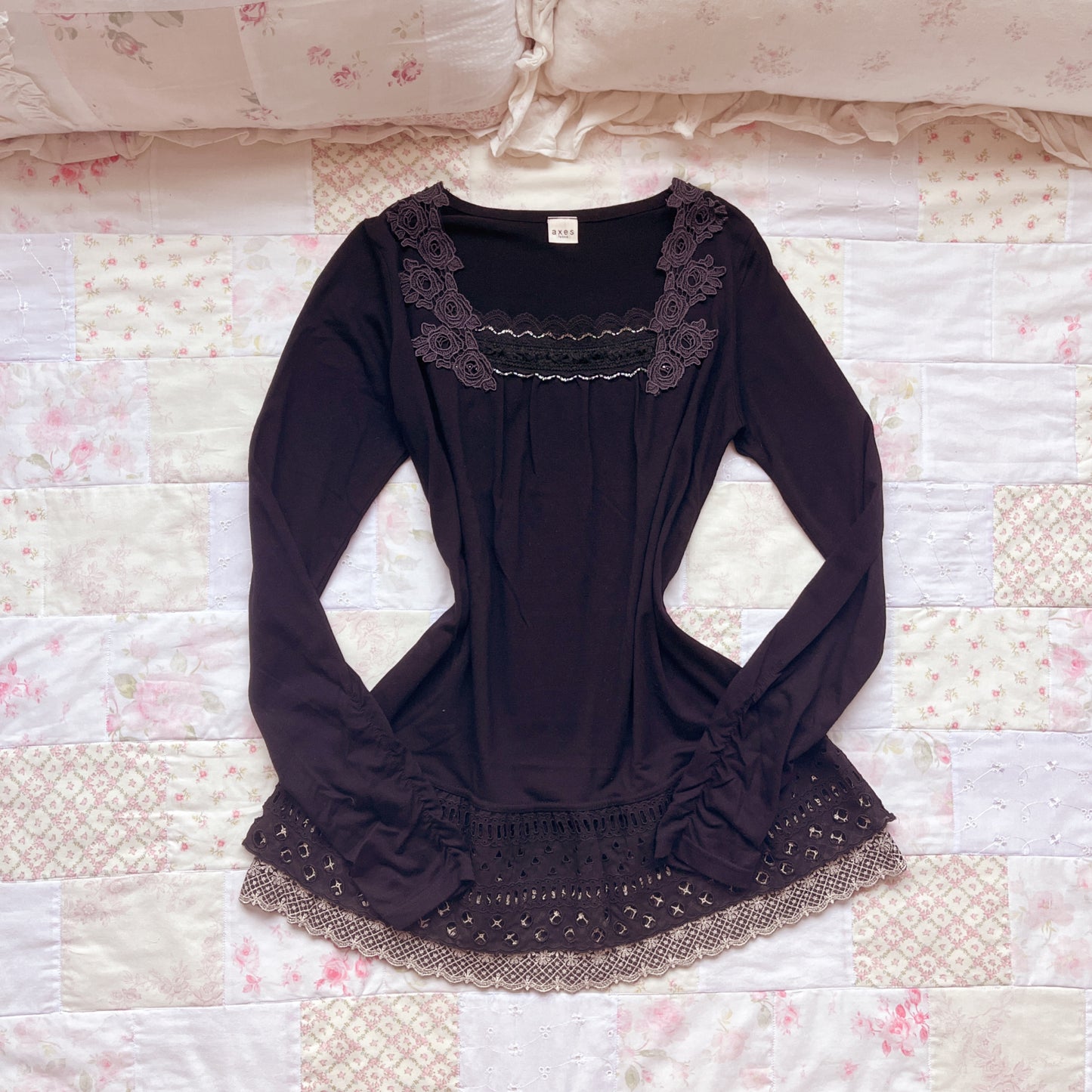 black ruffle accent long sleeve top