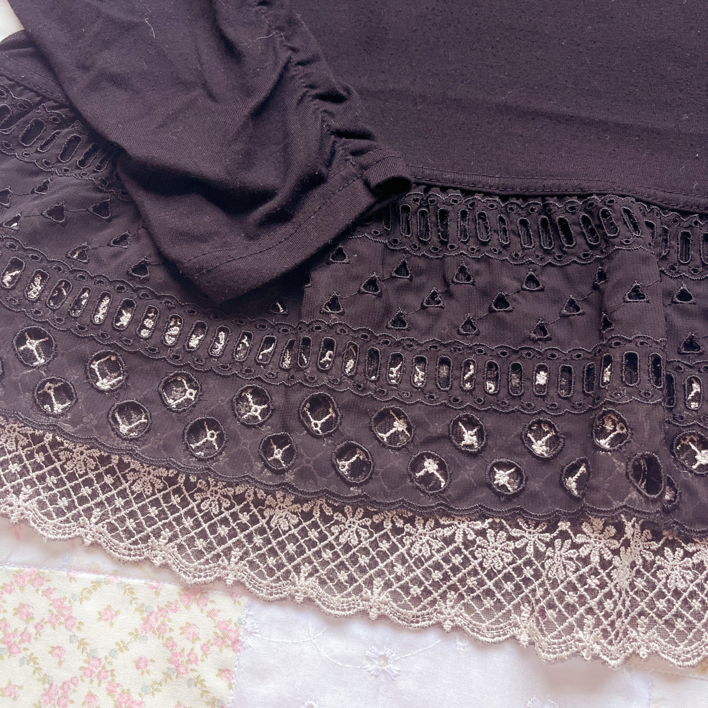 black ruffle accent long sleeve top