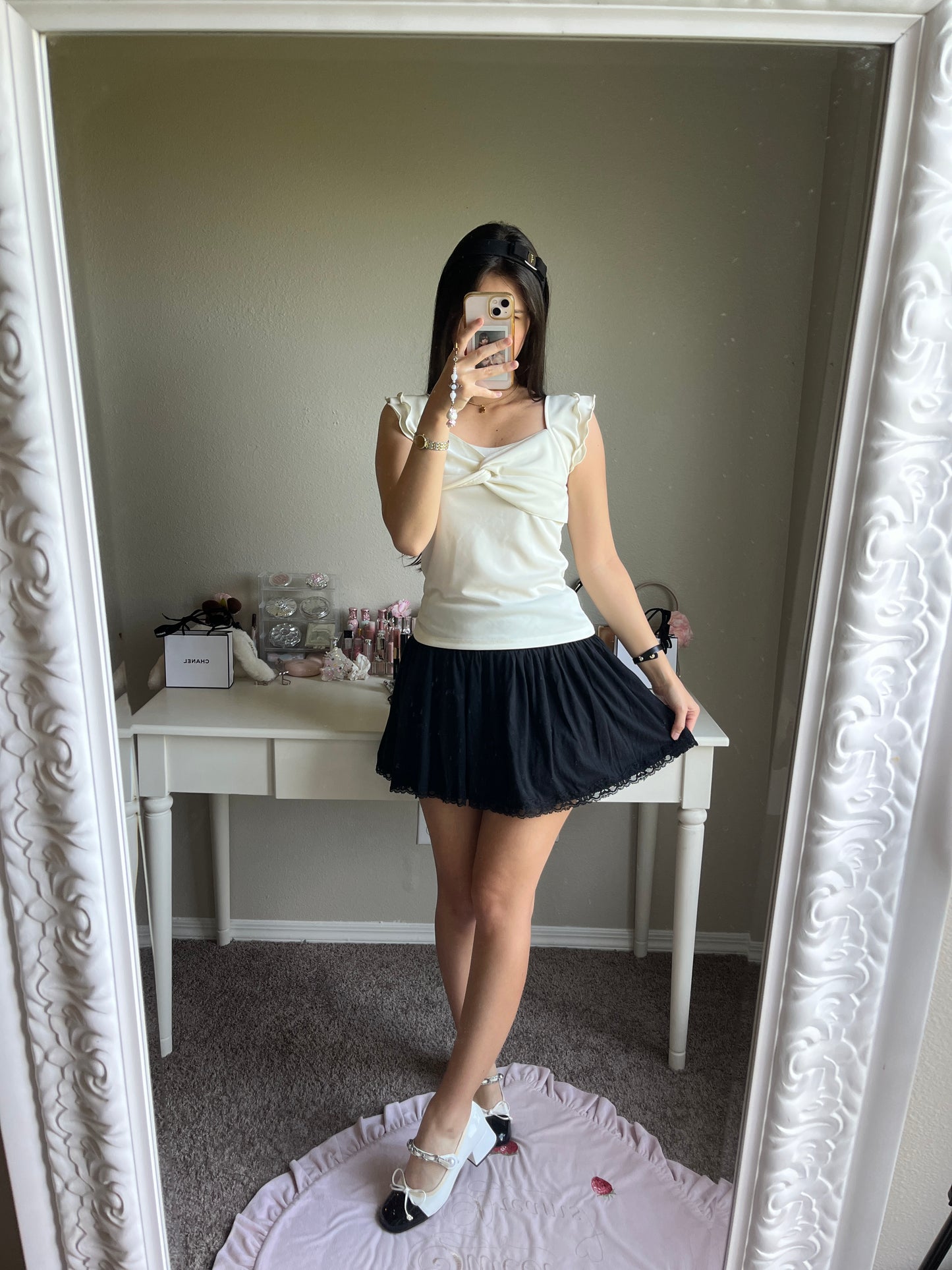 cream ruffle accent top