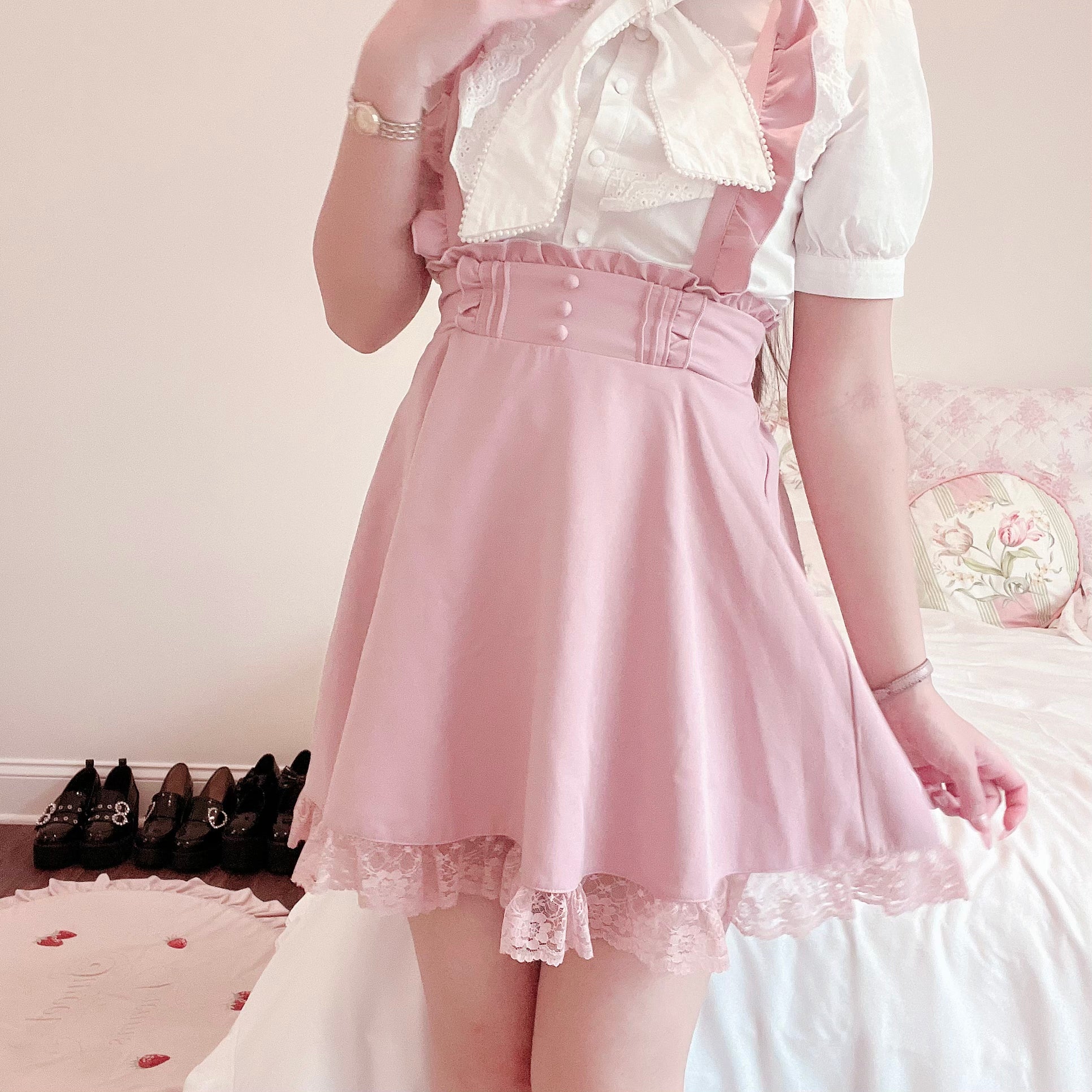 Pink skirt with clearance suspenders