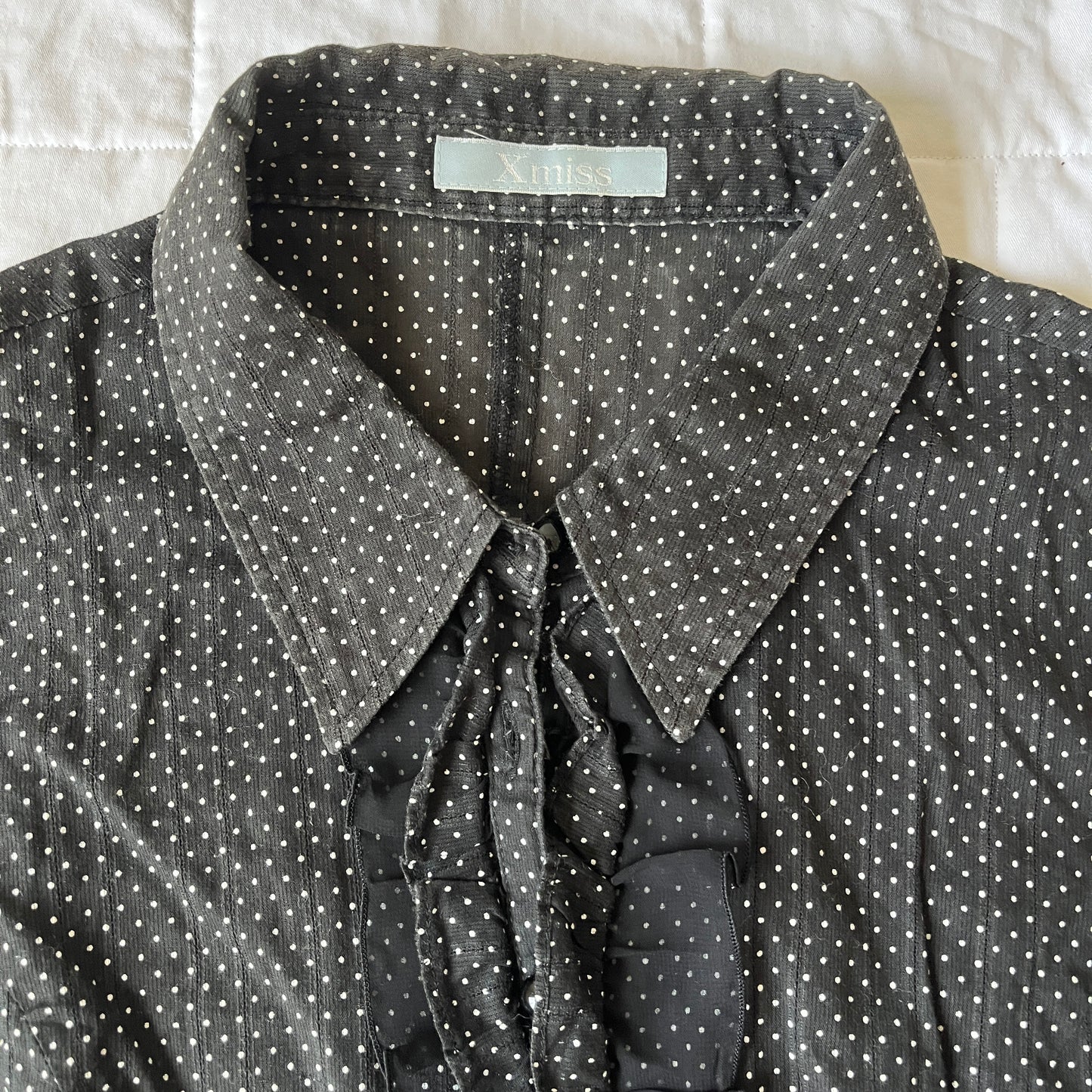 black polka dot fitted blouse