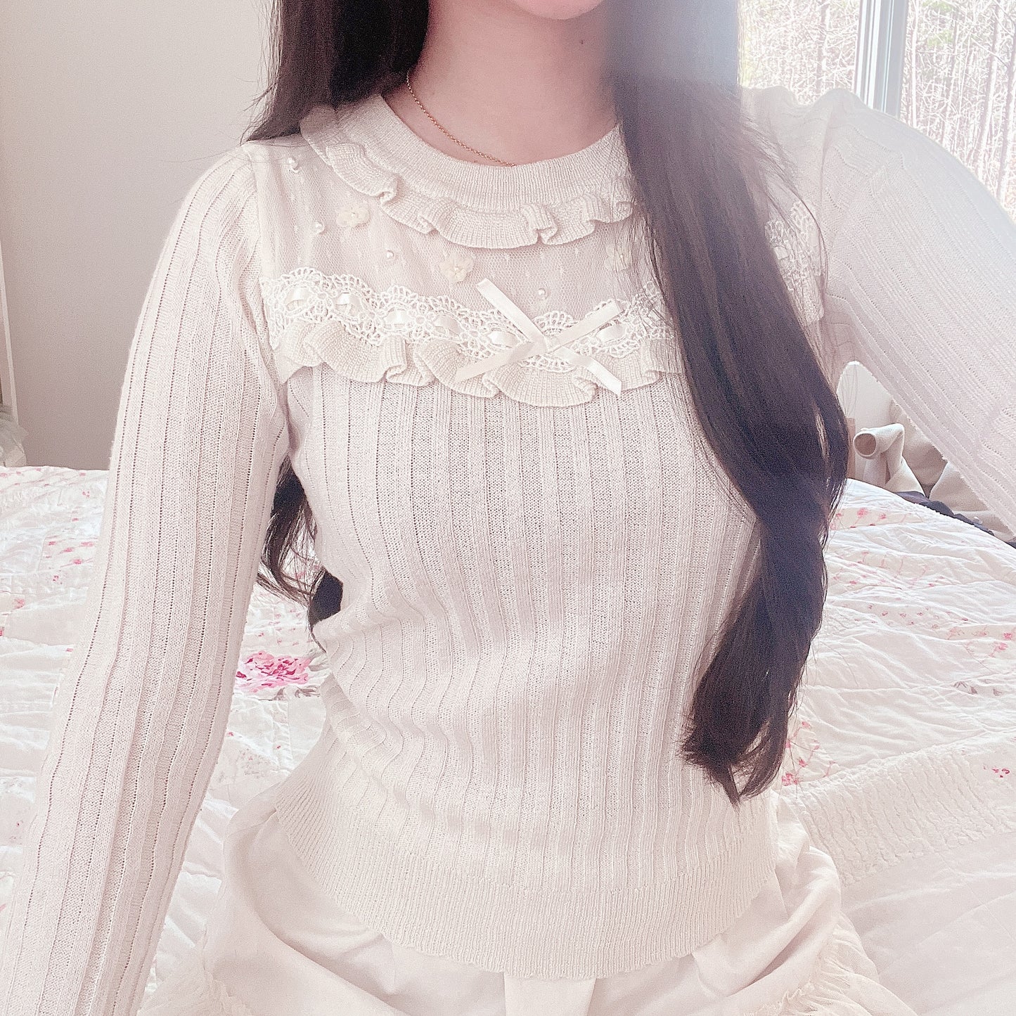 cream floral and pearl accent knit