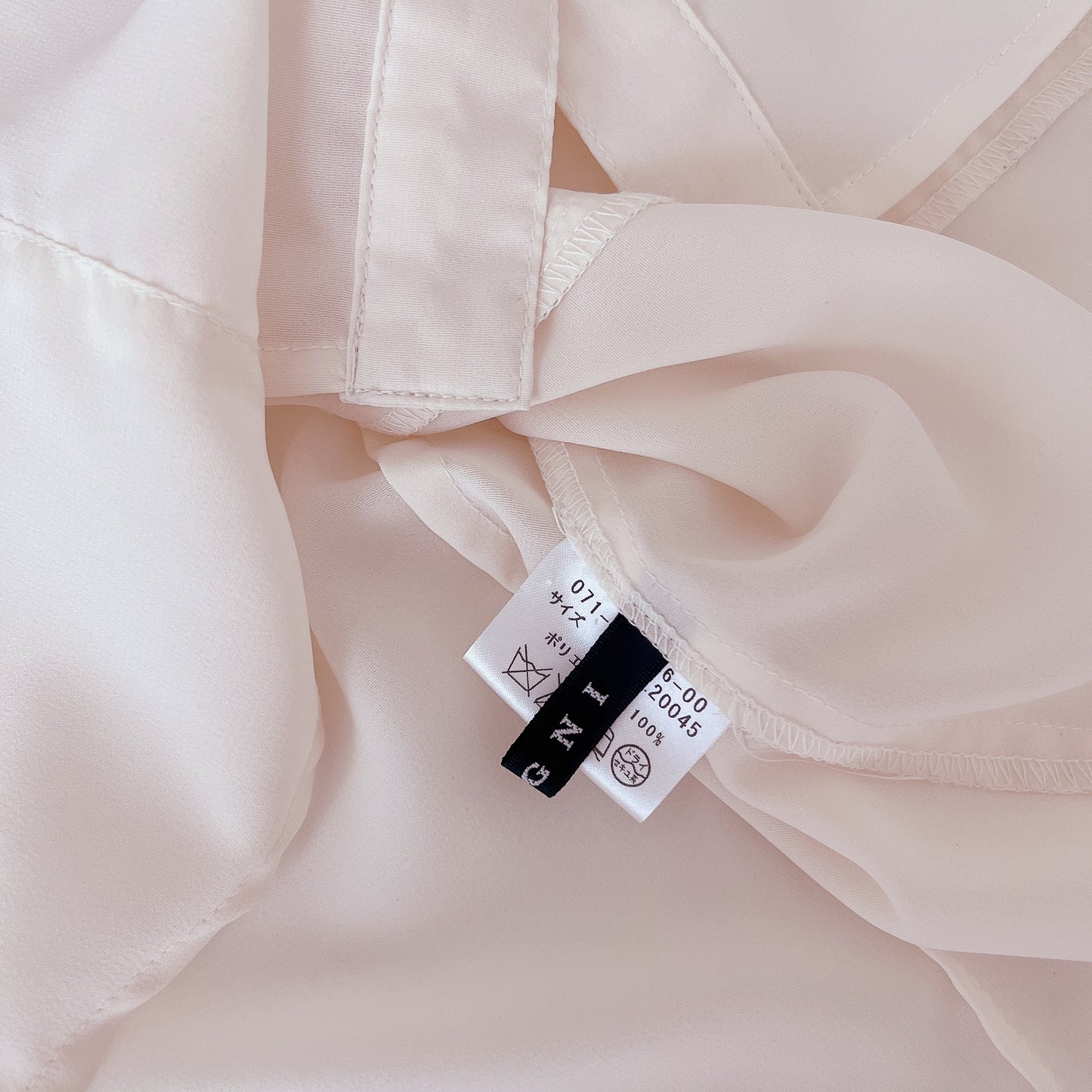 cream button down fitted blouse