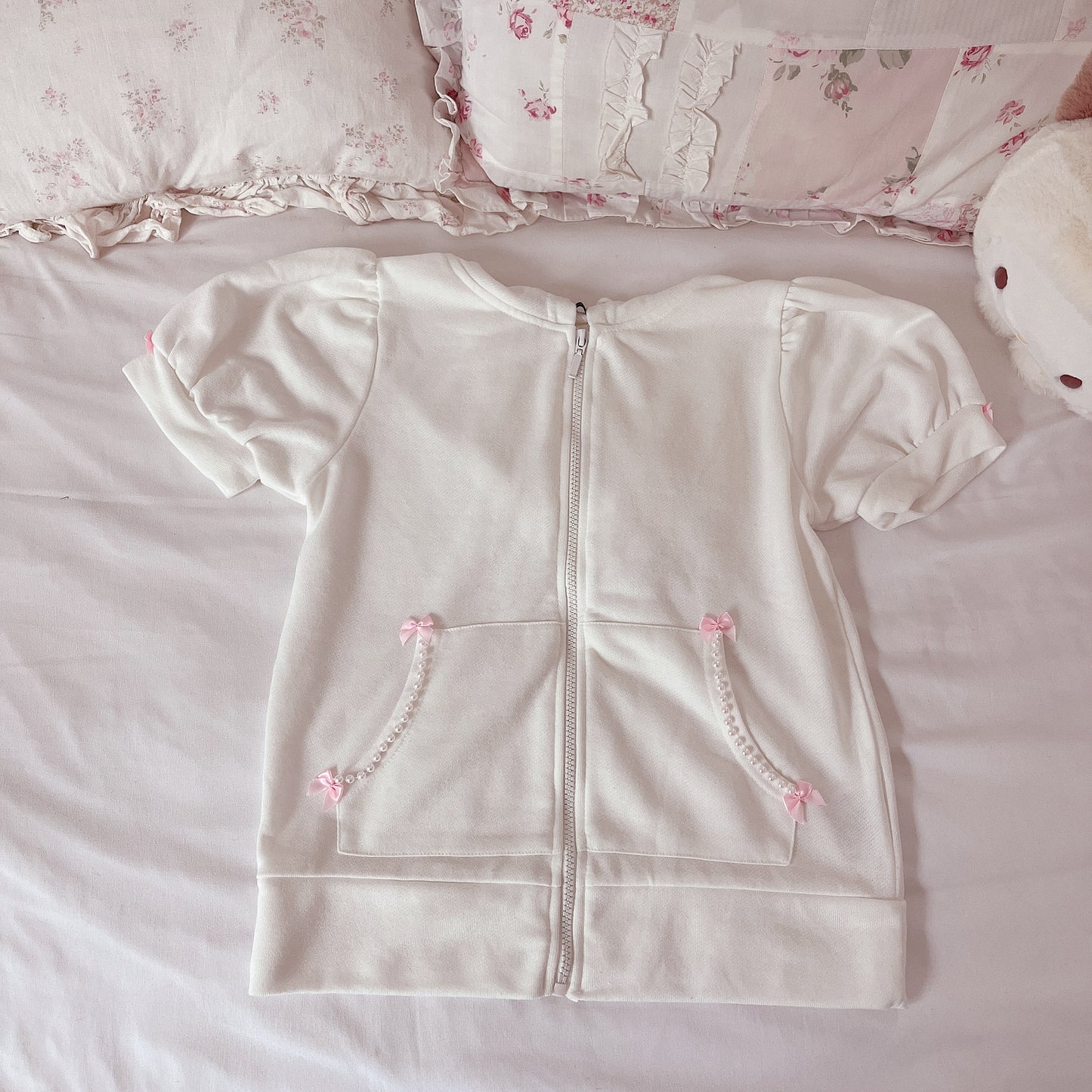 white ribbon accent short sleeve zip up