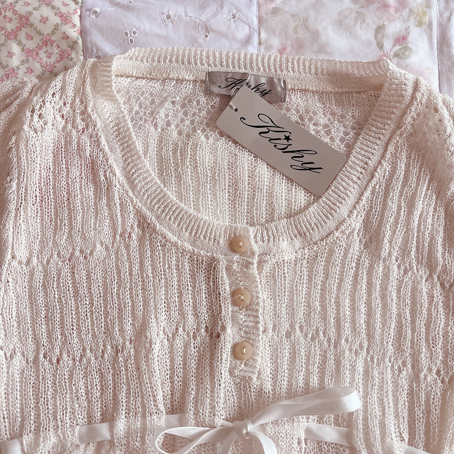 cream open knit top