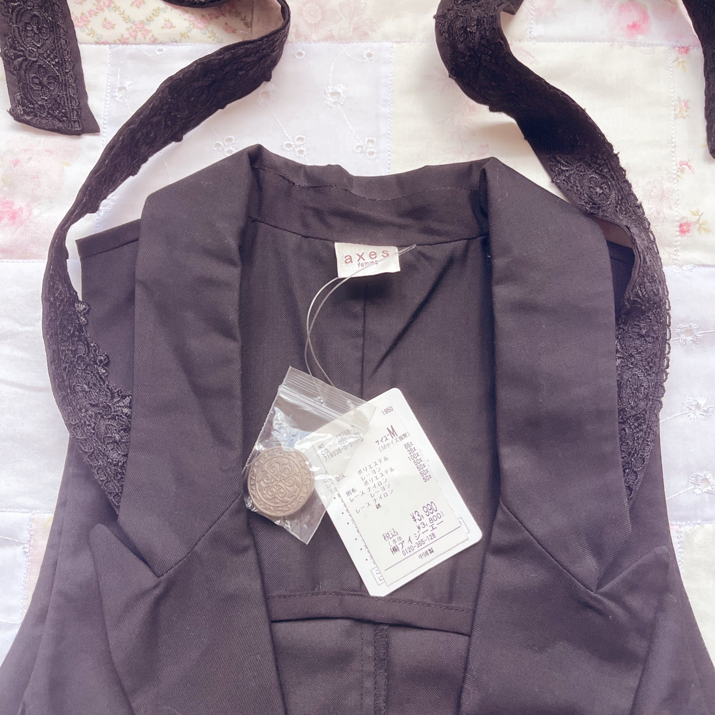 axes femme long black vest