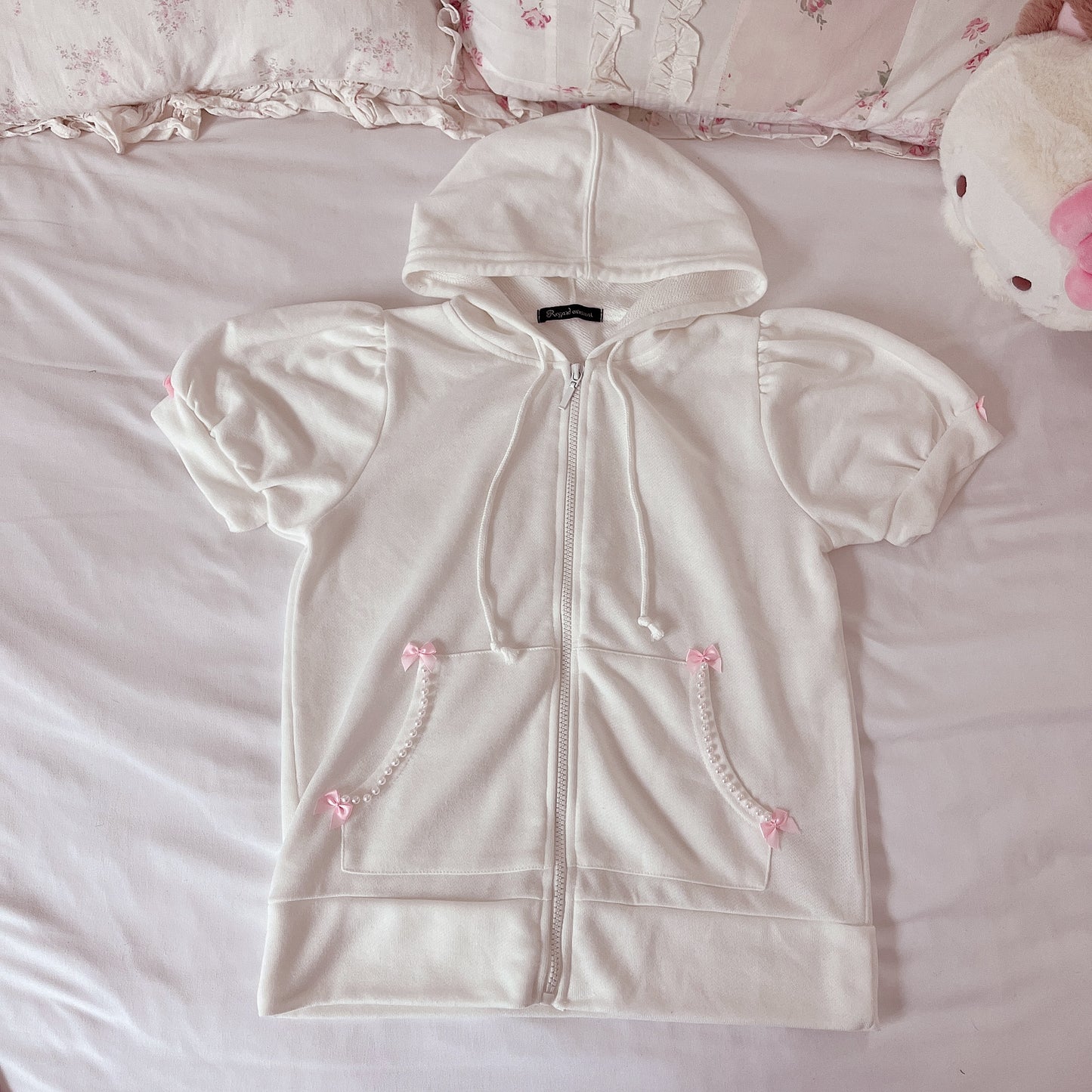white ribbon accent short sleeve zip up