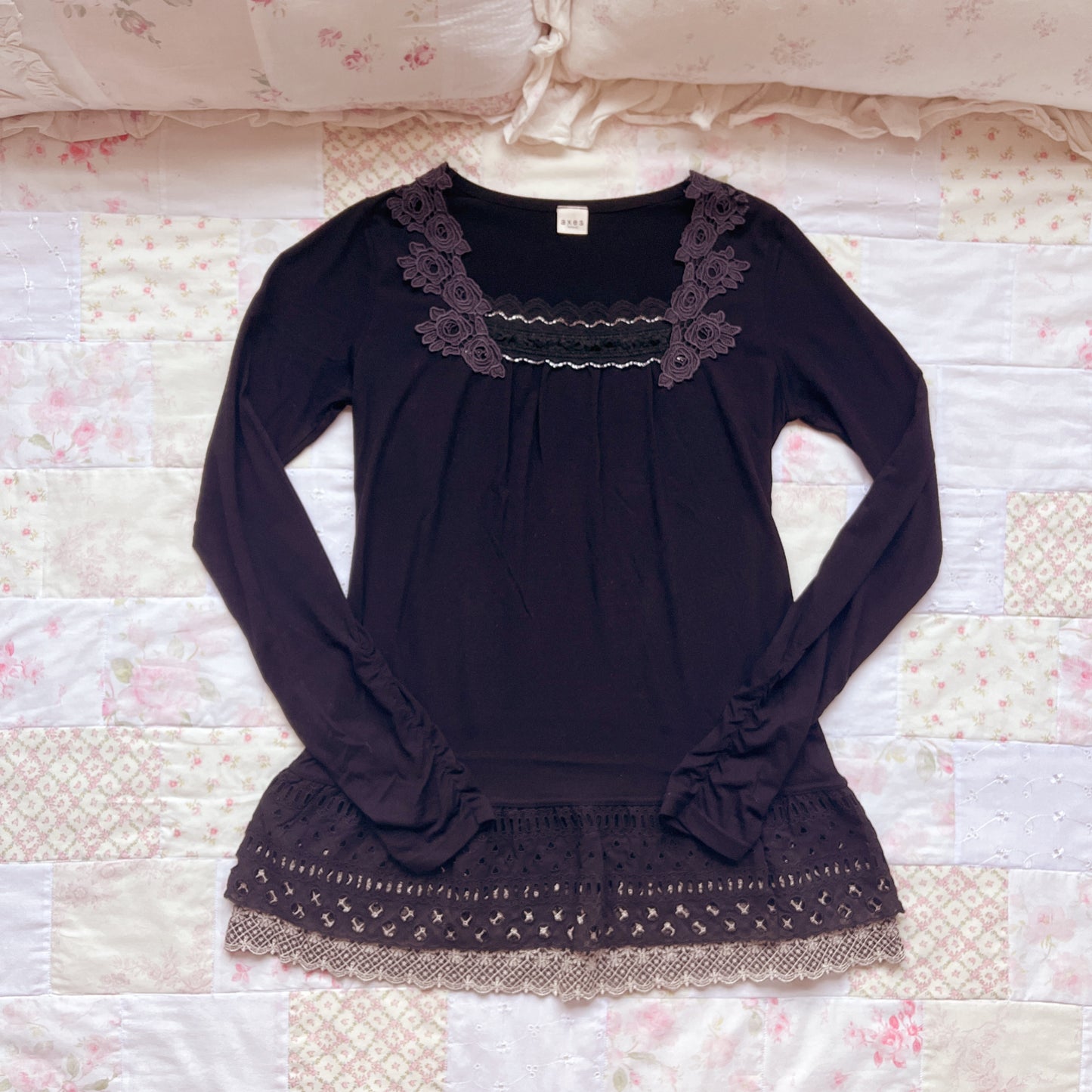 black ruffle accent long sleeve top