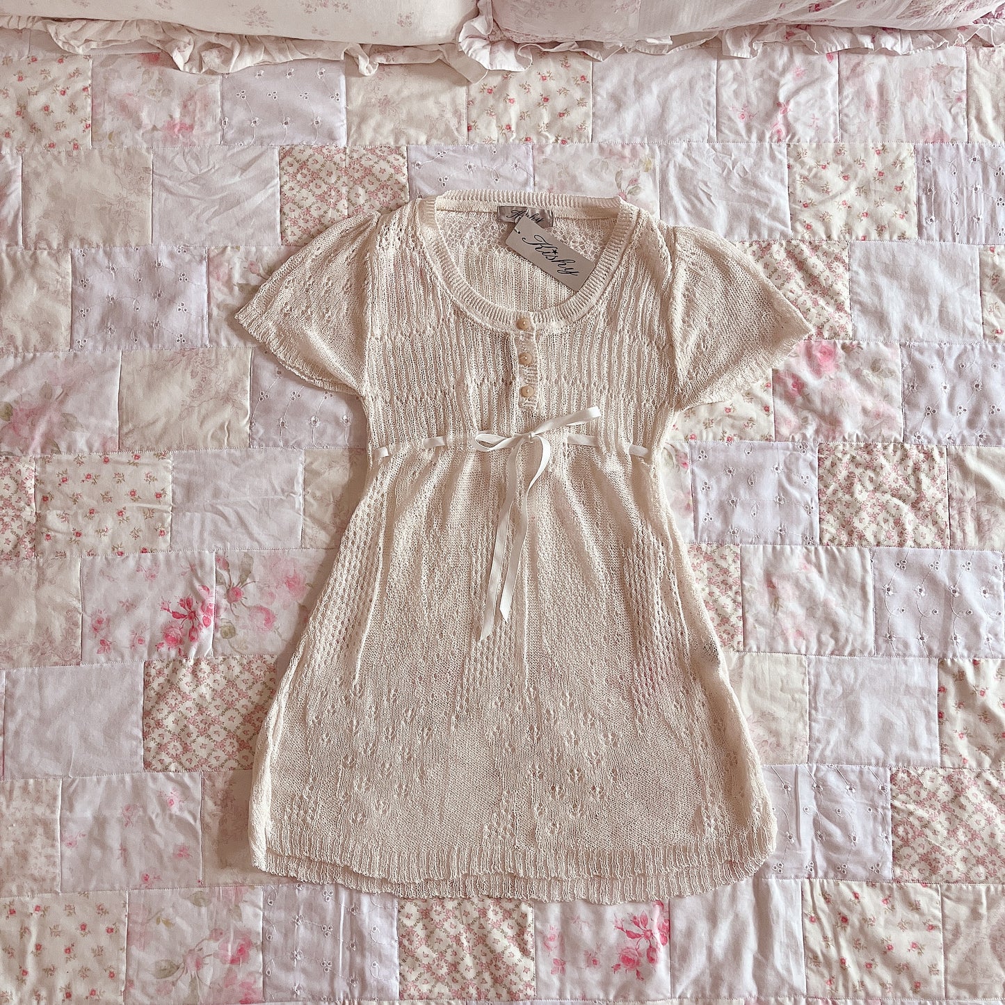 cream open knit top