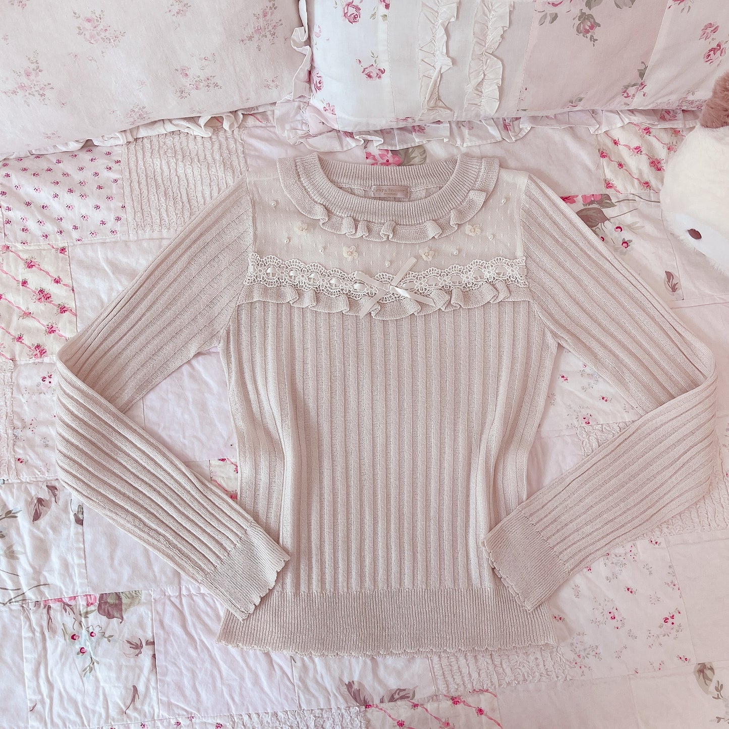 cream floral and pearl accent knit