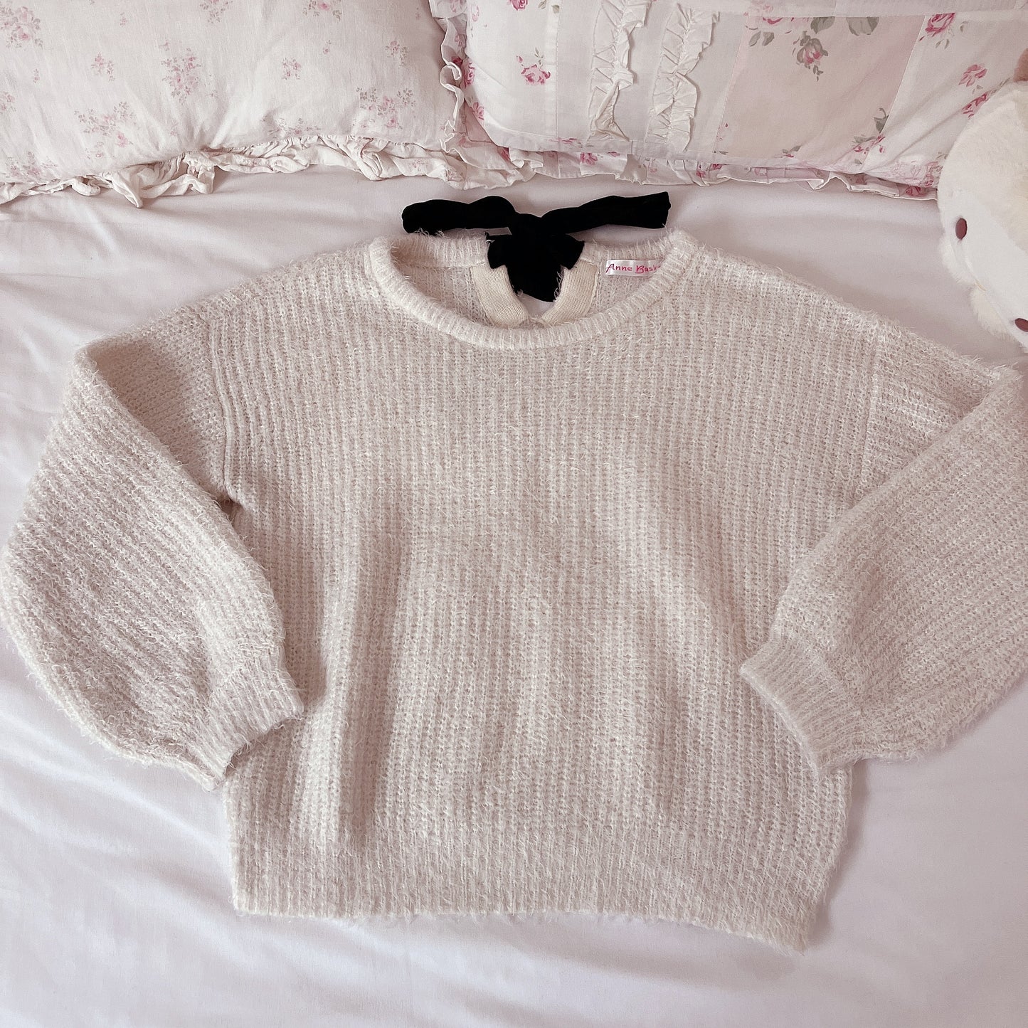 fluffy white back ribbon sweater