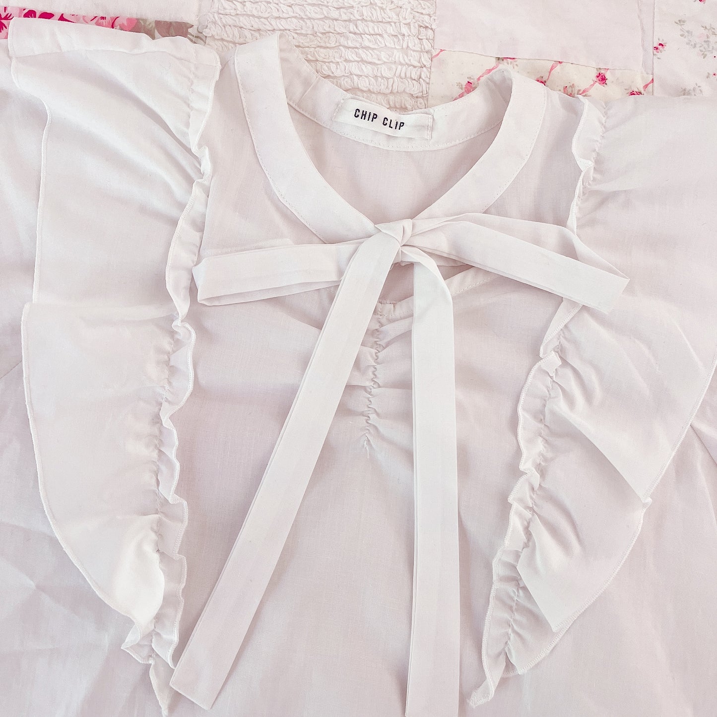 white ribbon tie blouse