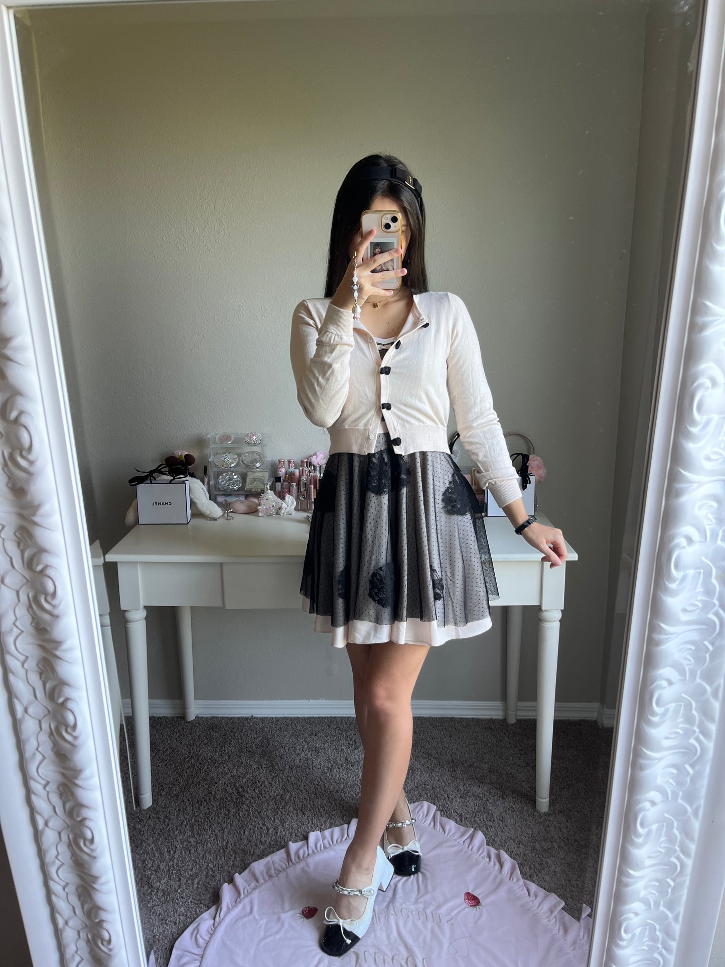 soft pink and black cardigan