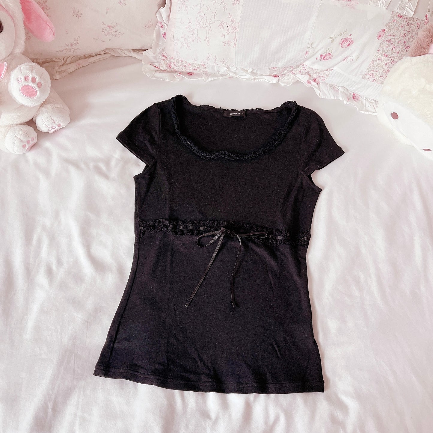 ribbon accent black knit top