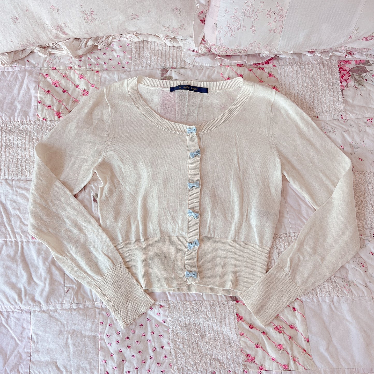 blue ribbon accent cream cardigan