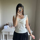 cream ruffle accent top
