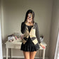 black polka motif cardigan