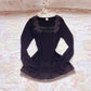 black ruffle accent long sleeve top