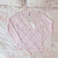 pink ribbon accent sweater