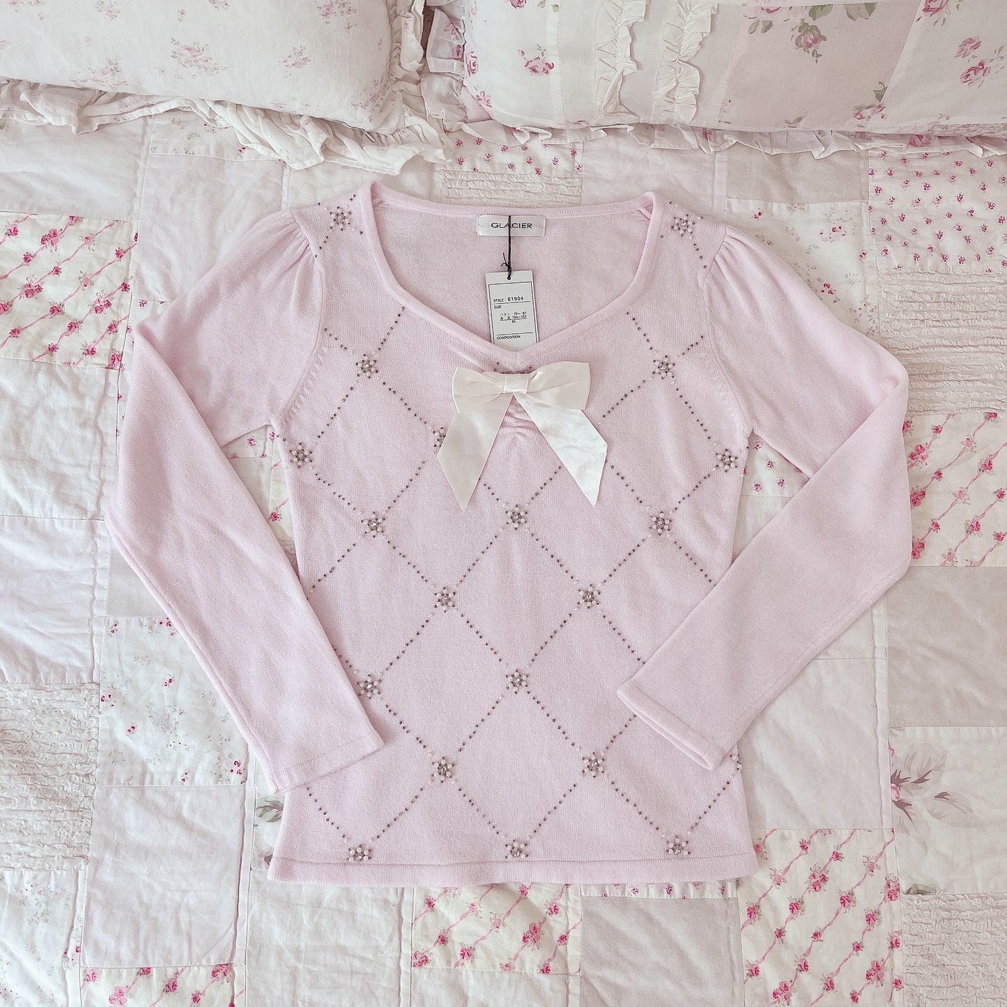 pink ribbon accent sweater