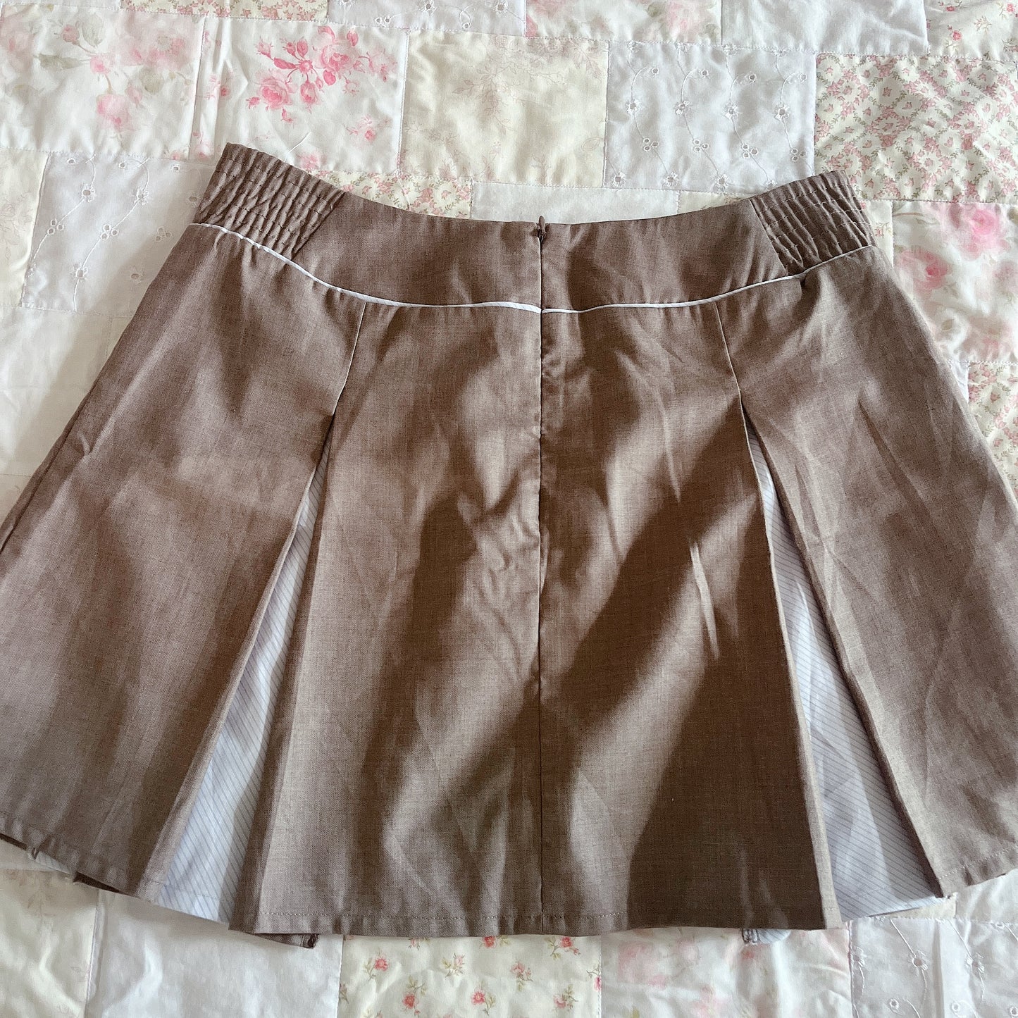 brown box pleat ribbon accent skirt