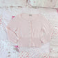 baby pink cardigan