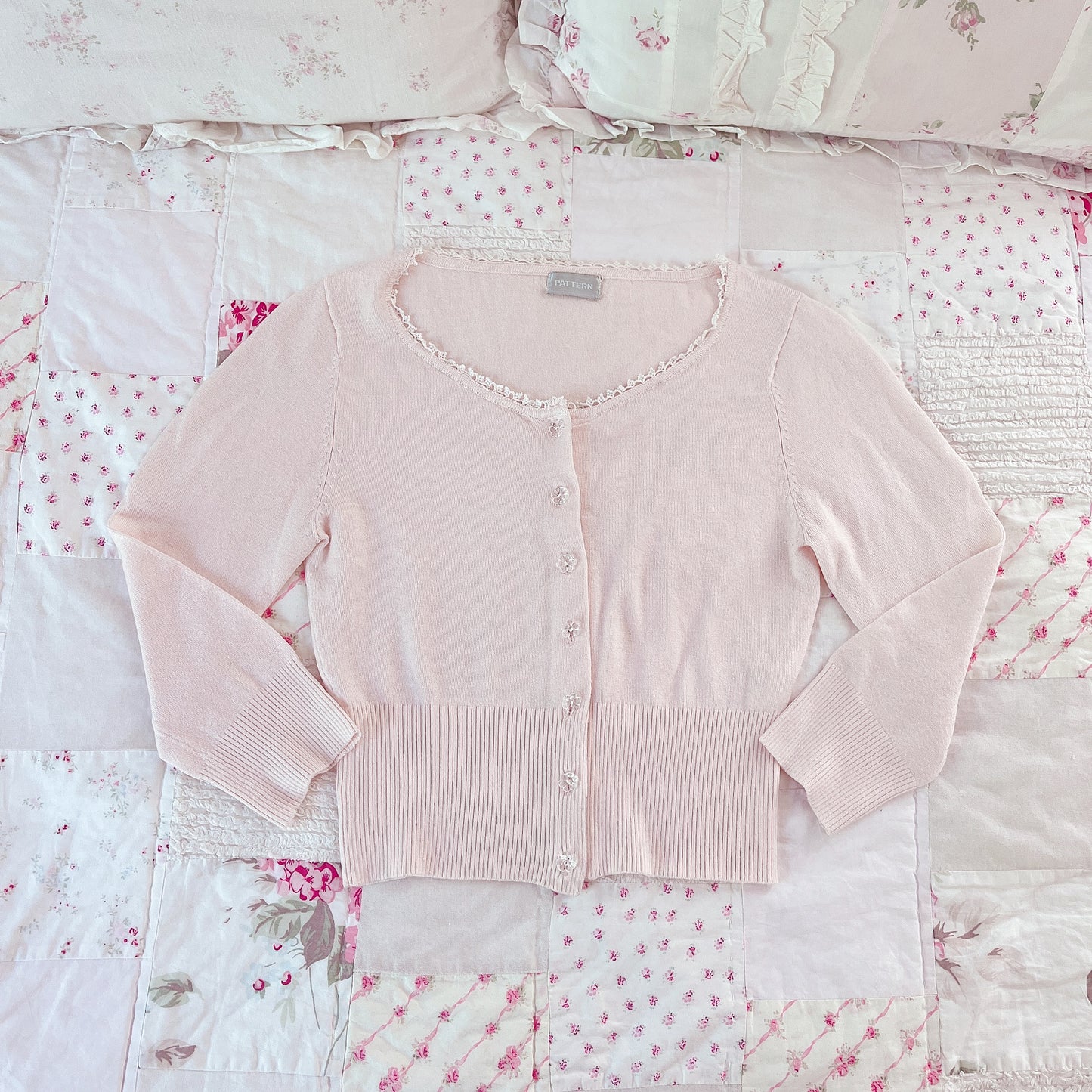 baby pink cardigan