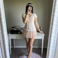 soft pink sleeveless blouse