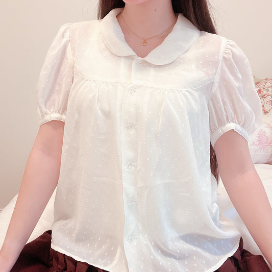 flowy cream babydoll blouse
