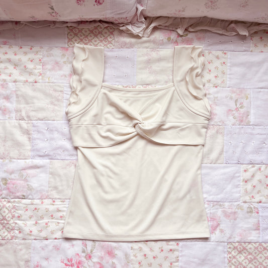 cream ruffle accent top