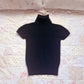 black wool knit turtleneck