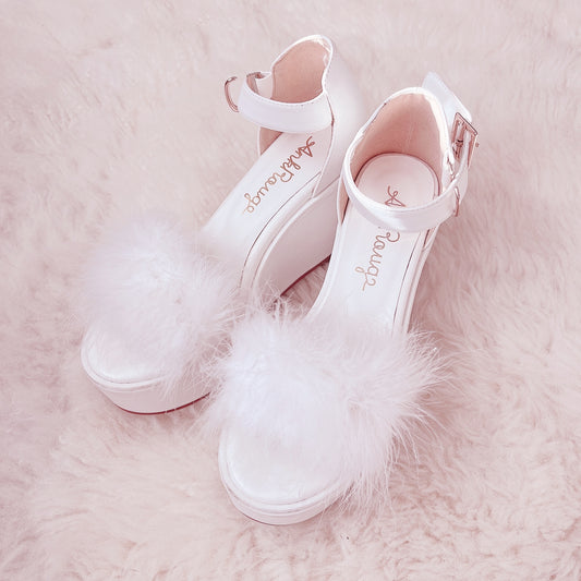 ank rouge fluffy white platforms