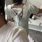 white lace-up back dress