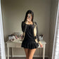 black polka motif cardigan
