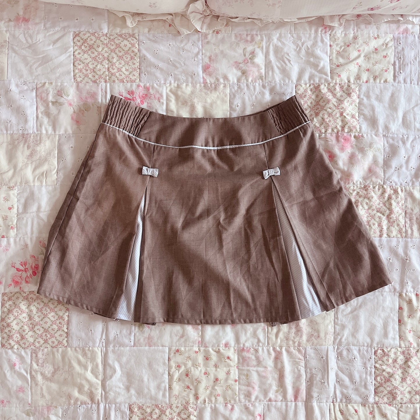 brown box pleat ribbon accent skirt