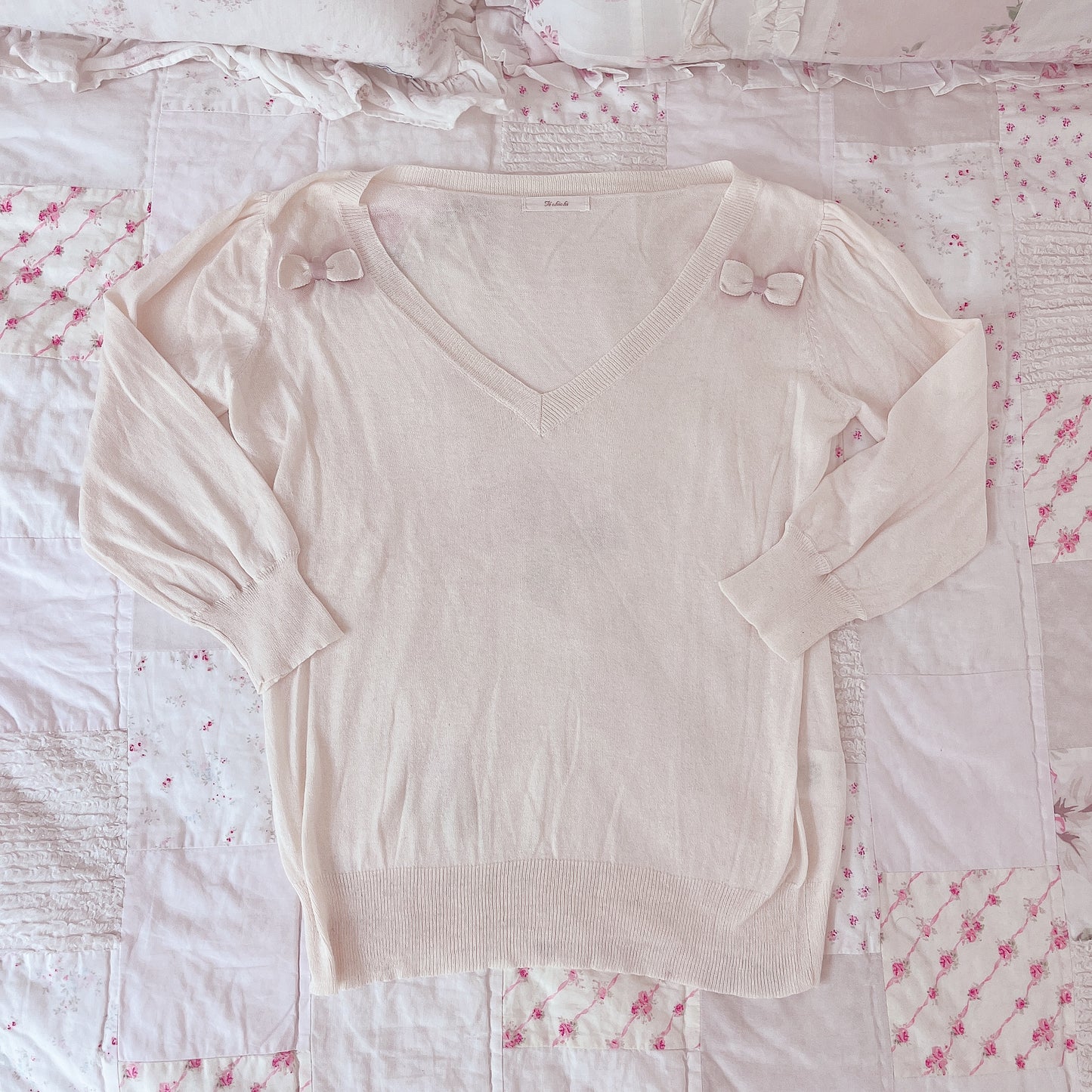 cream ribbon accent vneck sweater