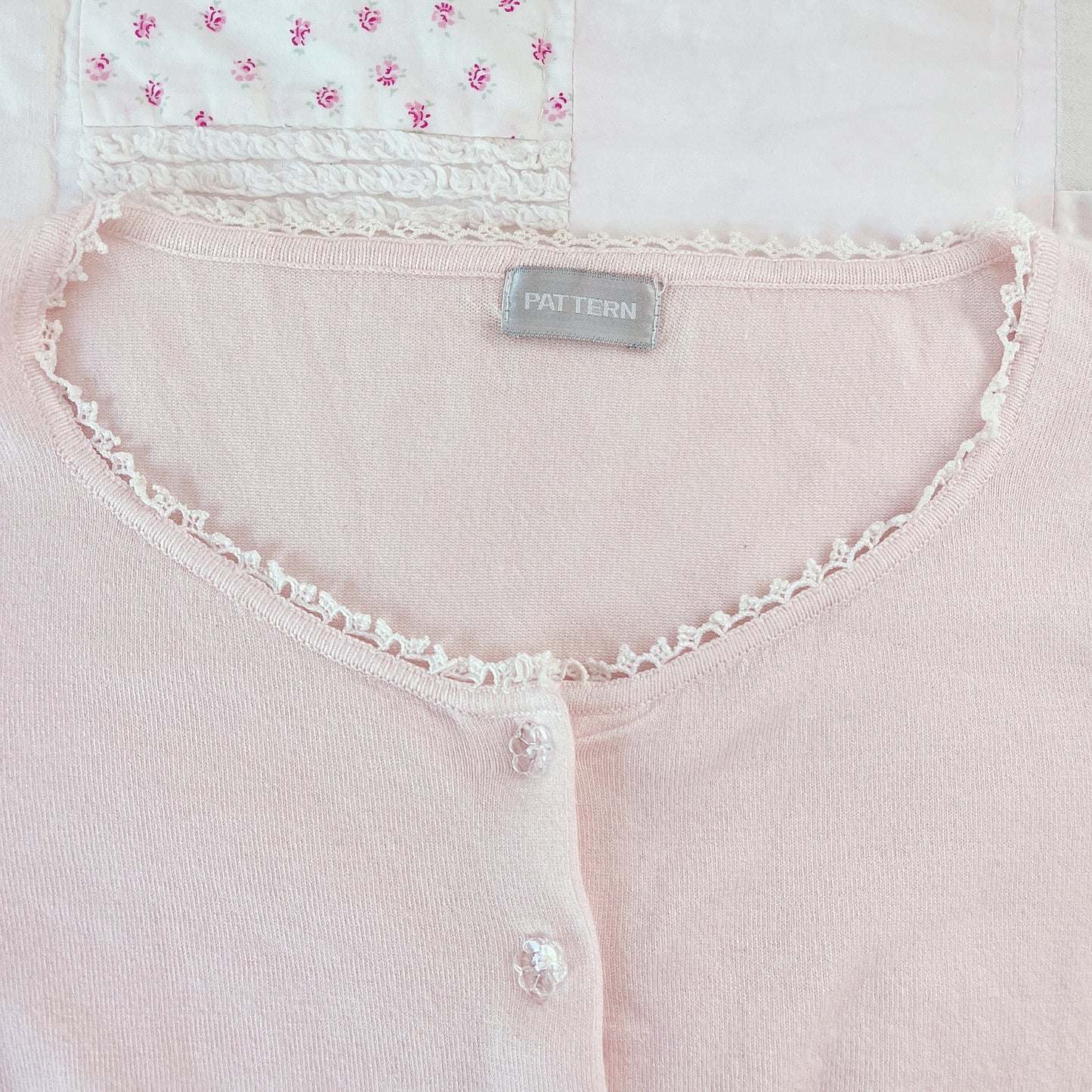 baby pink cardigan