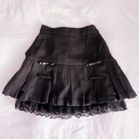 pium leather ribbon pleated skirt