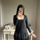 black embroidery accent top