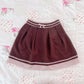 brown and pink skirt