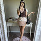 soft pink sleeveless blouse