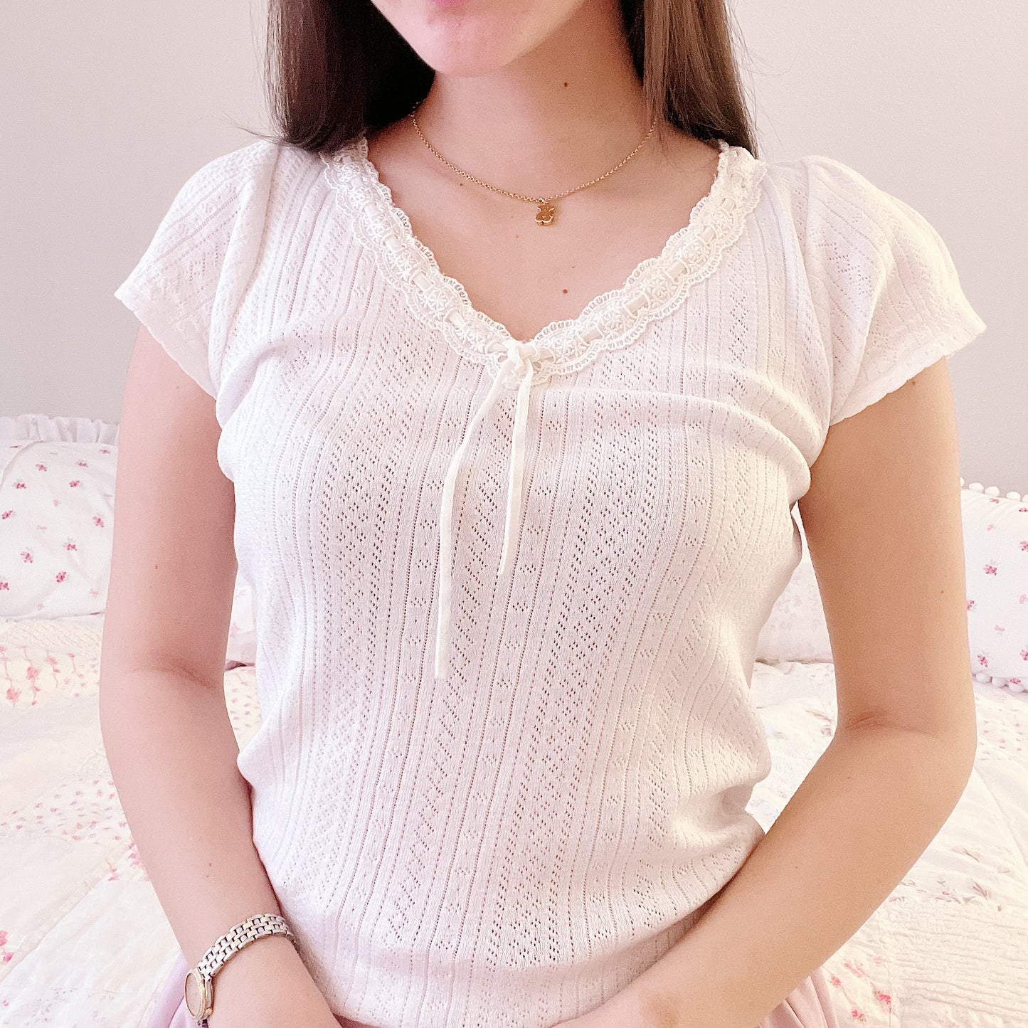 white pointelle knit top