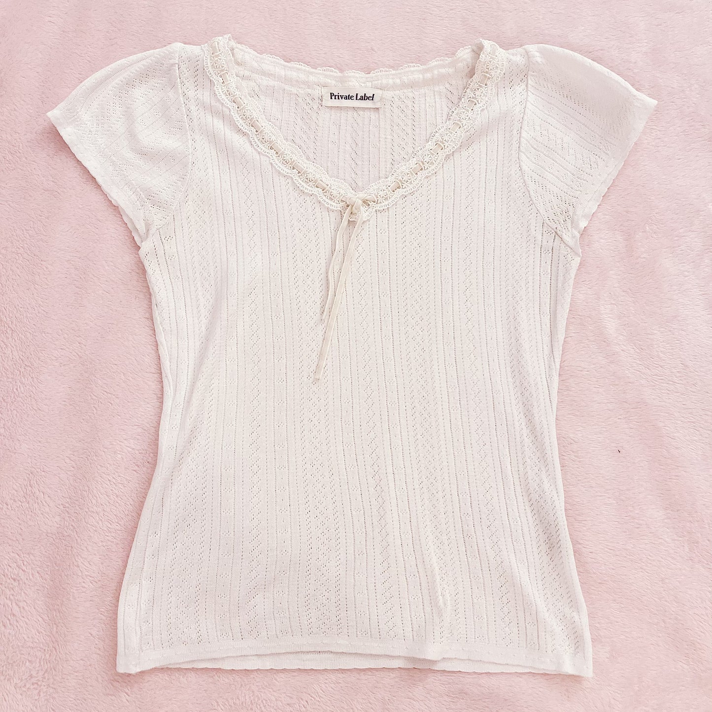 white pointelle knit top