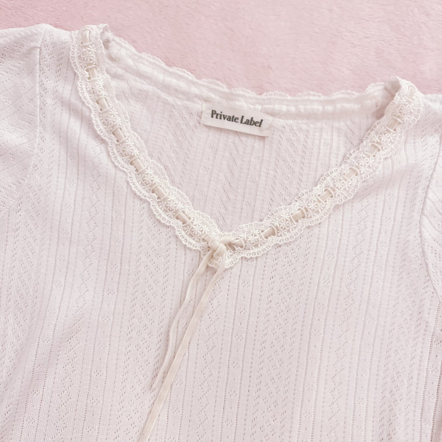 white pointelle knit top